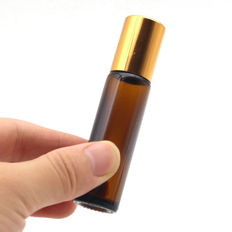 10 ml AMBER Glass Round Bottle + Steel Roll On + Gold Cap